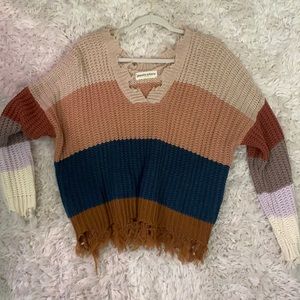Medium striped sweater.